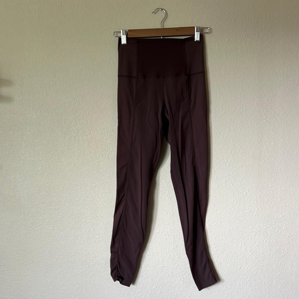 Chocolate Nike Yoga dri fit leggings.